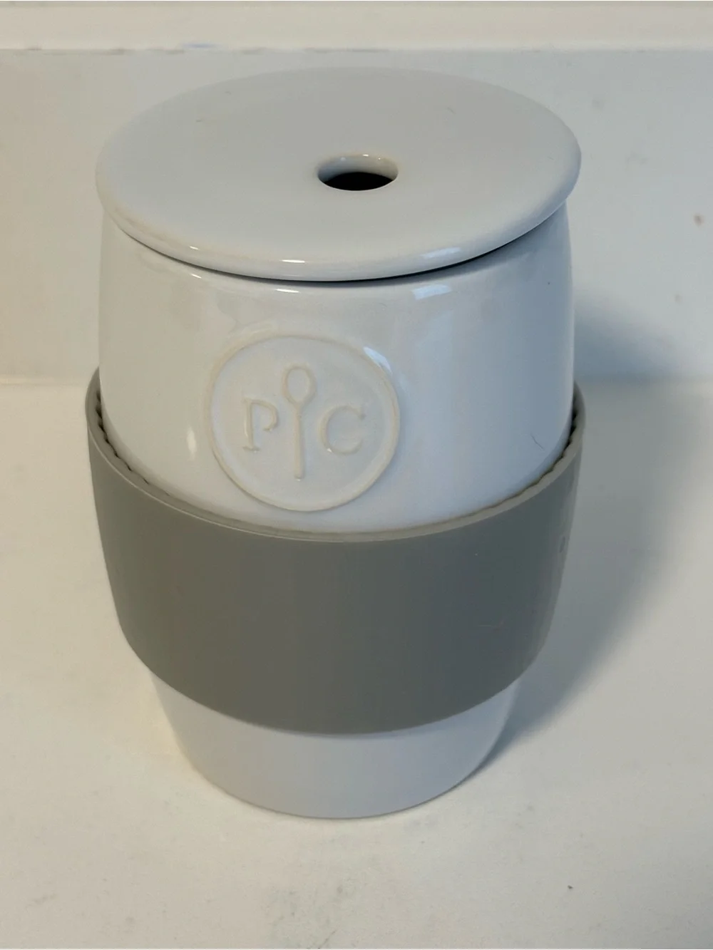 Pampered Chef White Ceramic Travel Mug with Gray Silicone Grip